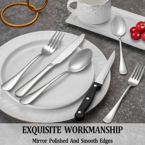 Elegant cutlery set with polished utensils on a table.