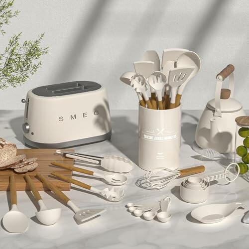 Kitchen utensils and Smeg toaster on marble countertop.