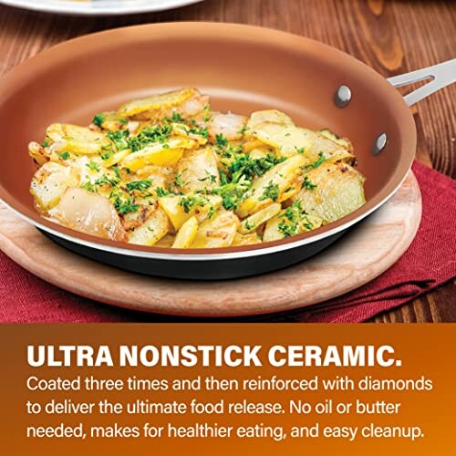 Nonstick ceramic frying pan with cooked food