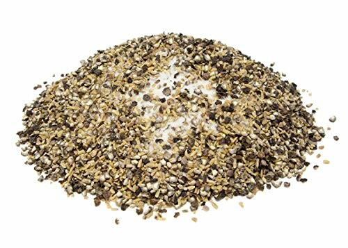 A pile of coarse black pepper on a white background.