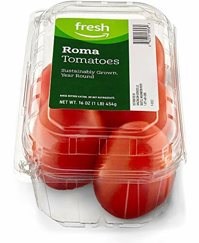 Pack of fresh Roma tomatoes in plastic container.